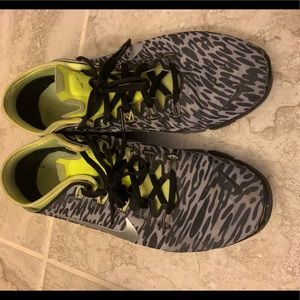 Nike black and lime green leopard shoes